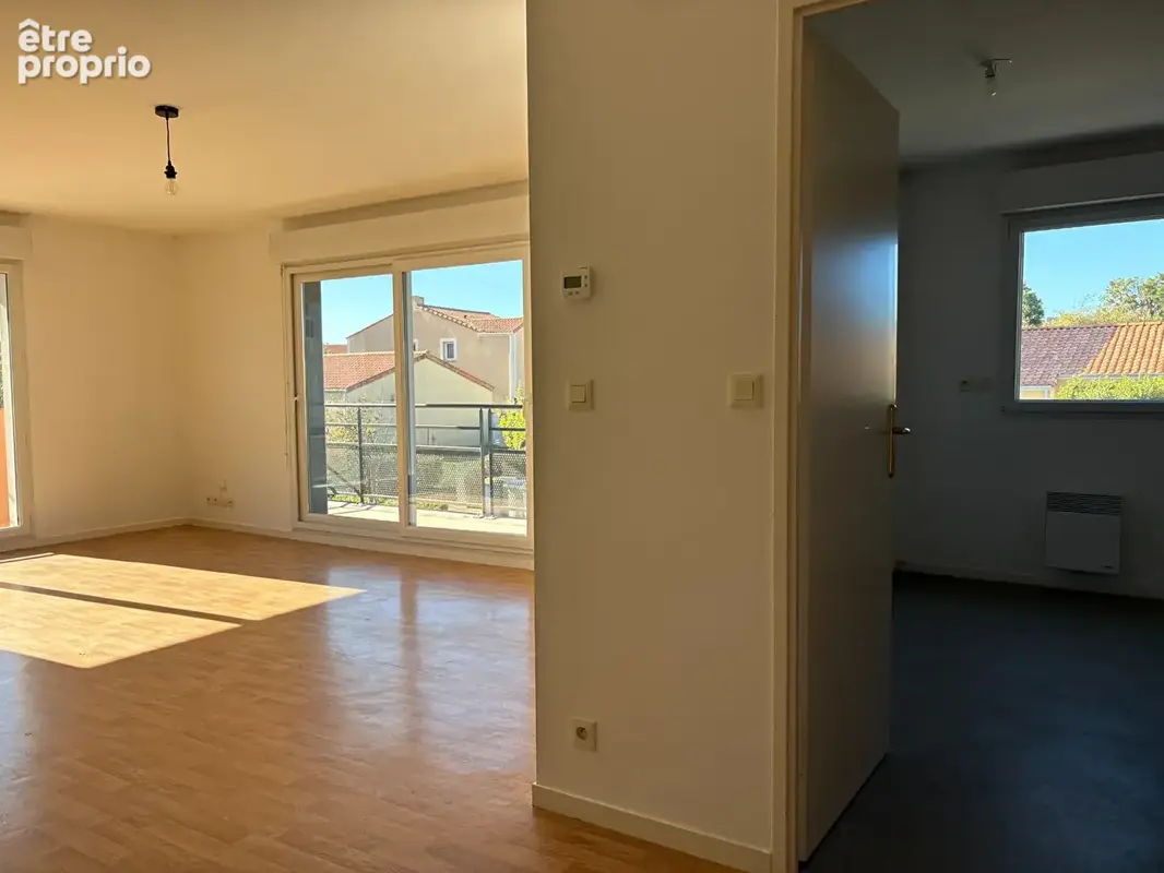 Appartement T4 de 83 m² avec balcon, garage double et cave - photo 7