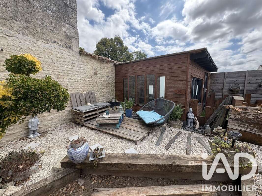 Maison 99 m² à Thaire  - photo 8