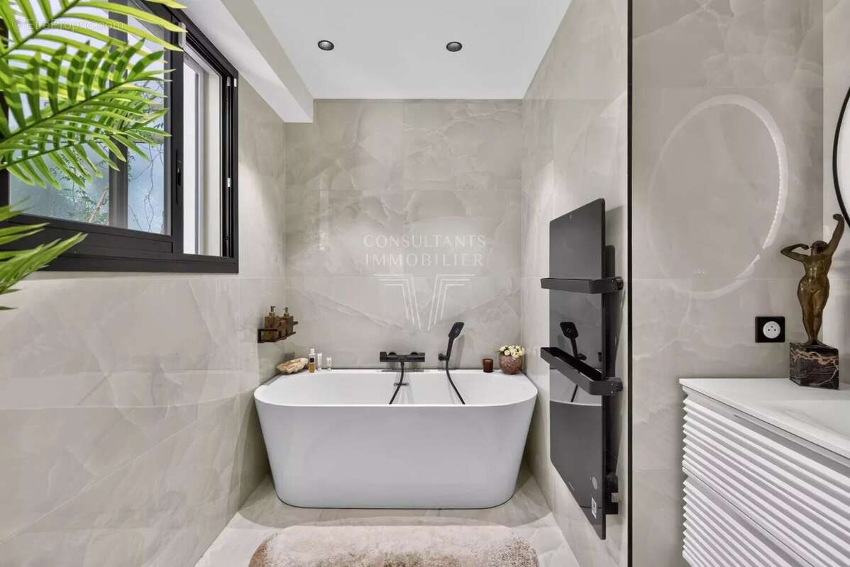 Appartement d'exception en rez-de-jardin. - photo 17