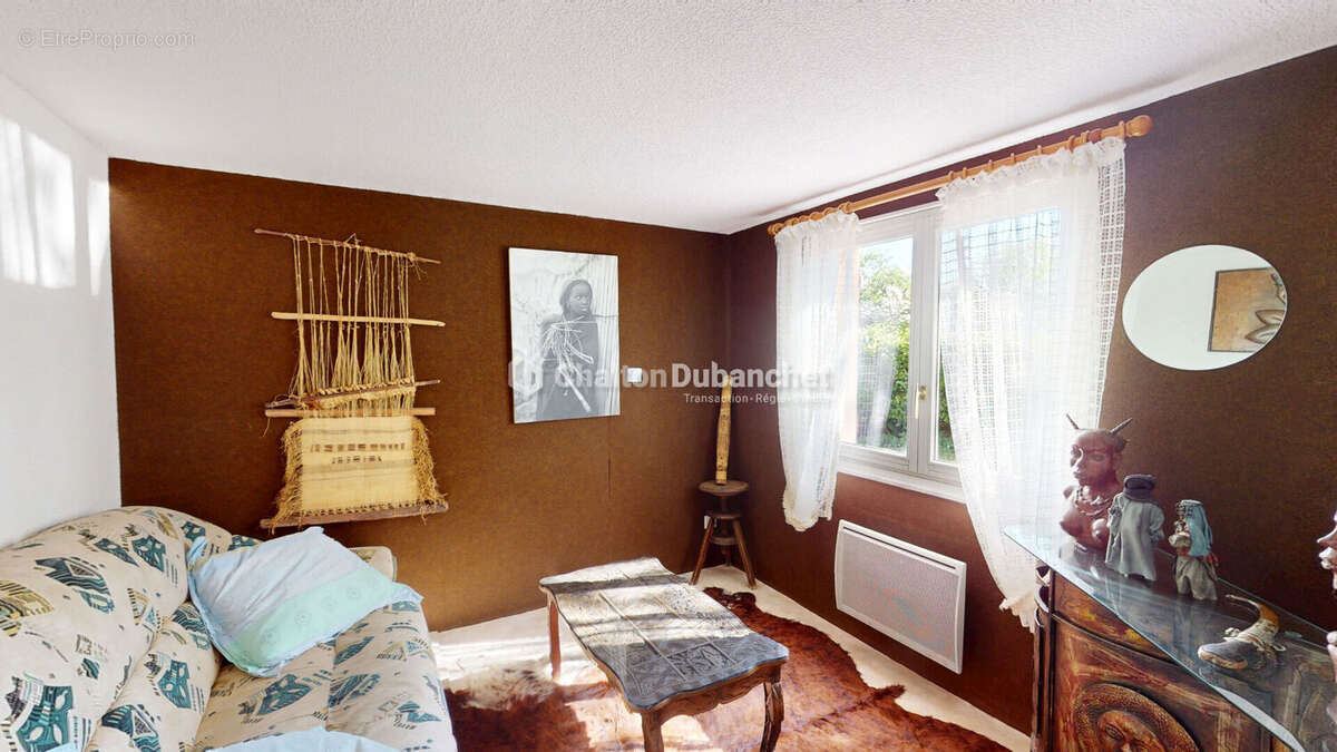 COURS LA VILLE - Maison de 116 m² - photo 11