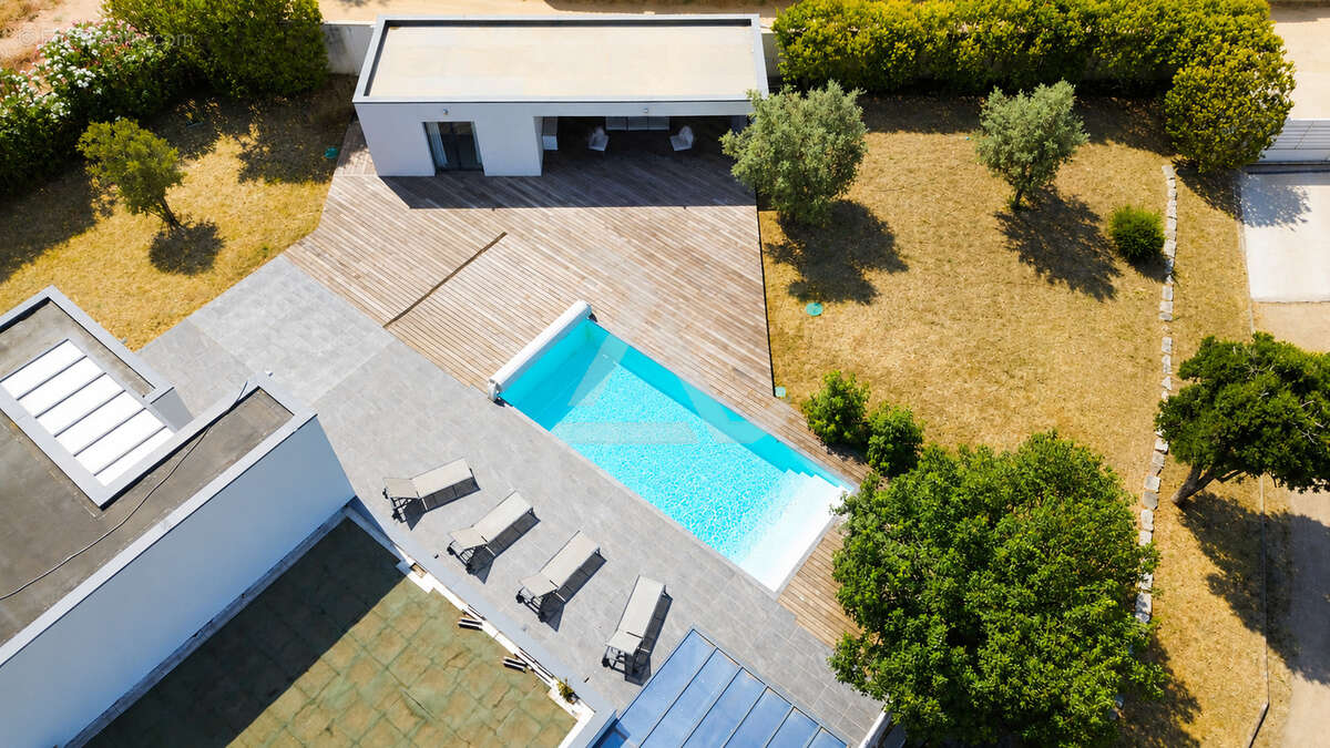 Villa t7 de 211m2 contemporaine avec piscine sous-sol aménagé et chambre indépendante - photo 6