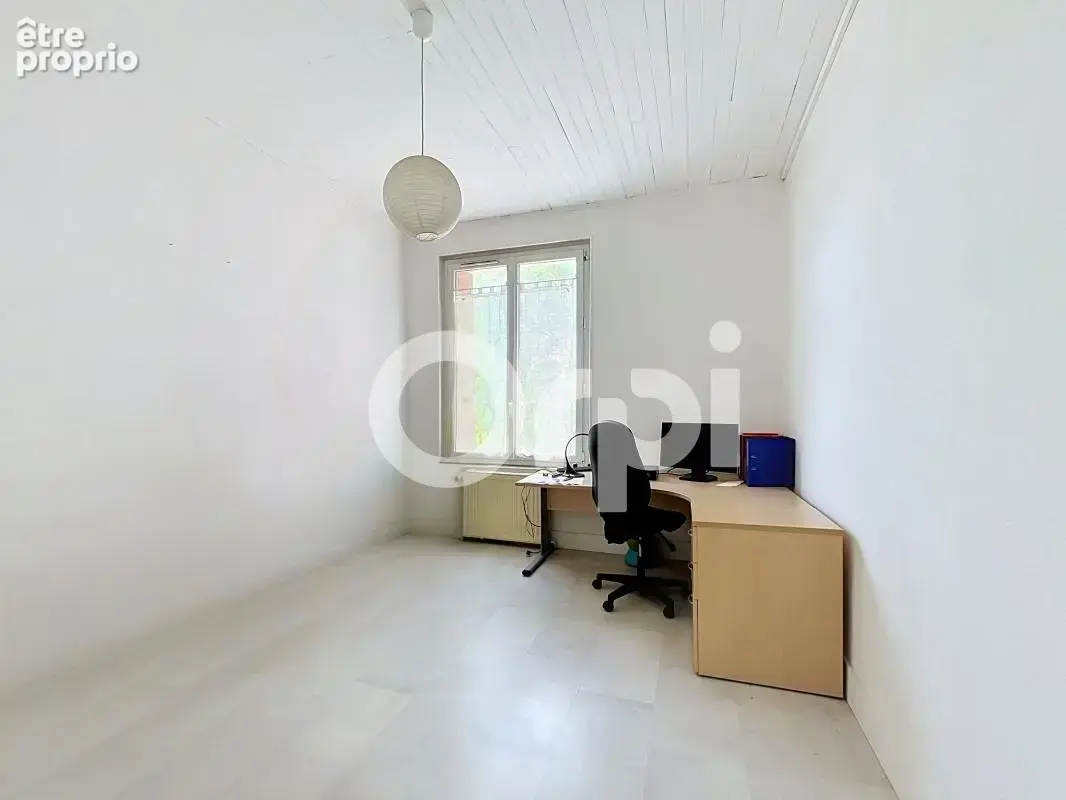 Demeure de caractère en pierre (179 m²) – Charme, volumes & potentiel mixte - photo 19