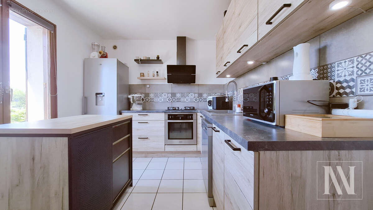 Maison de plain-pied avec sous-sol semi-aménagé   Emplacement recherché, proche de toutes commodités - photo 4