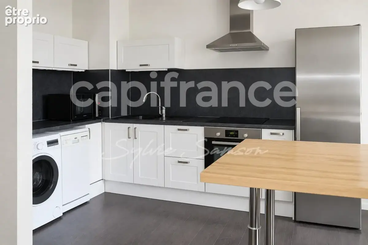 Mantes-la-Jolie – Appartement T3 traversant de 61 m² avec parking, cave et séchoir - photo 3