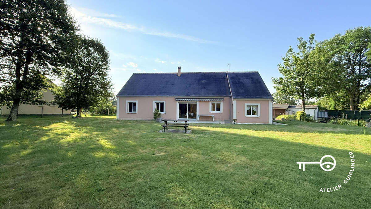 Le confort d'un pavillon moderne dans un cadre verdoyant et paisible - photo 17