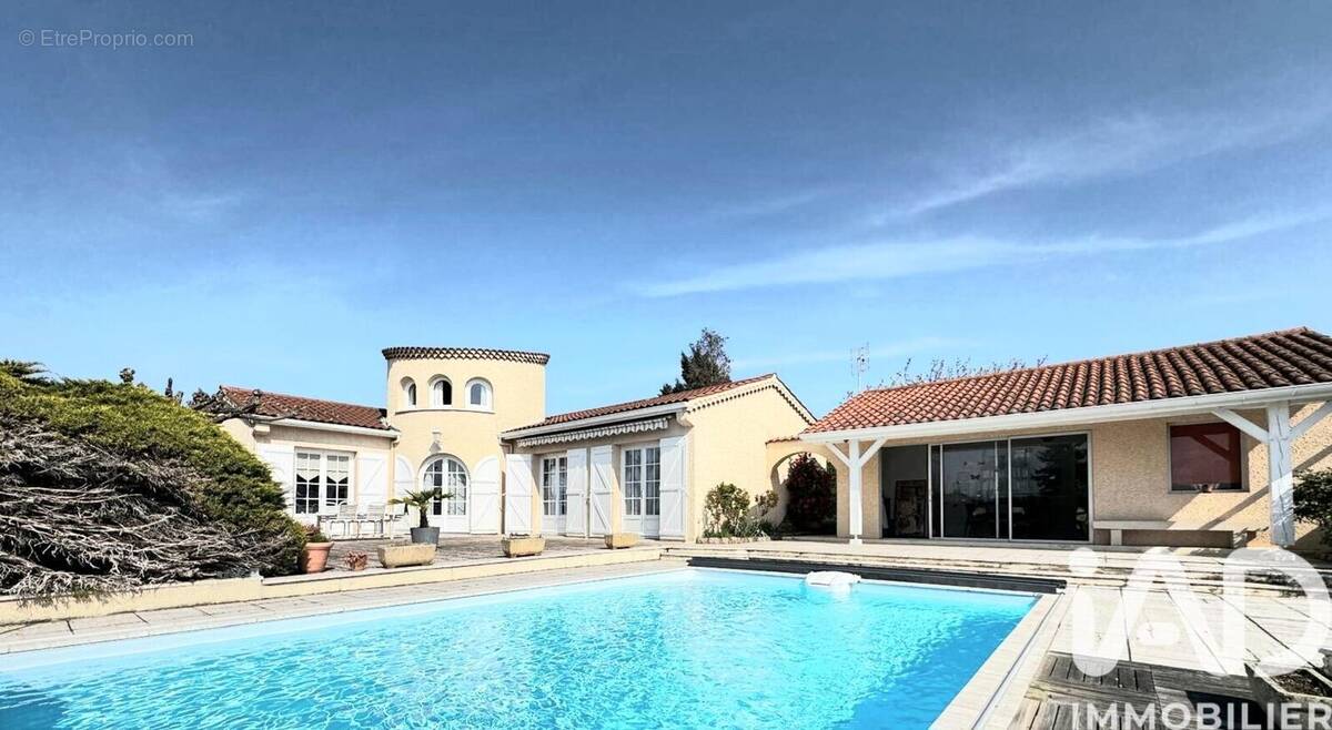 Photo 1 - Maison à SURY-LE-COMTAL