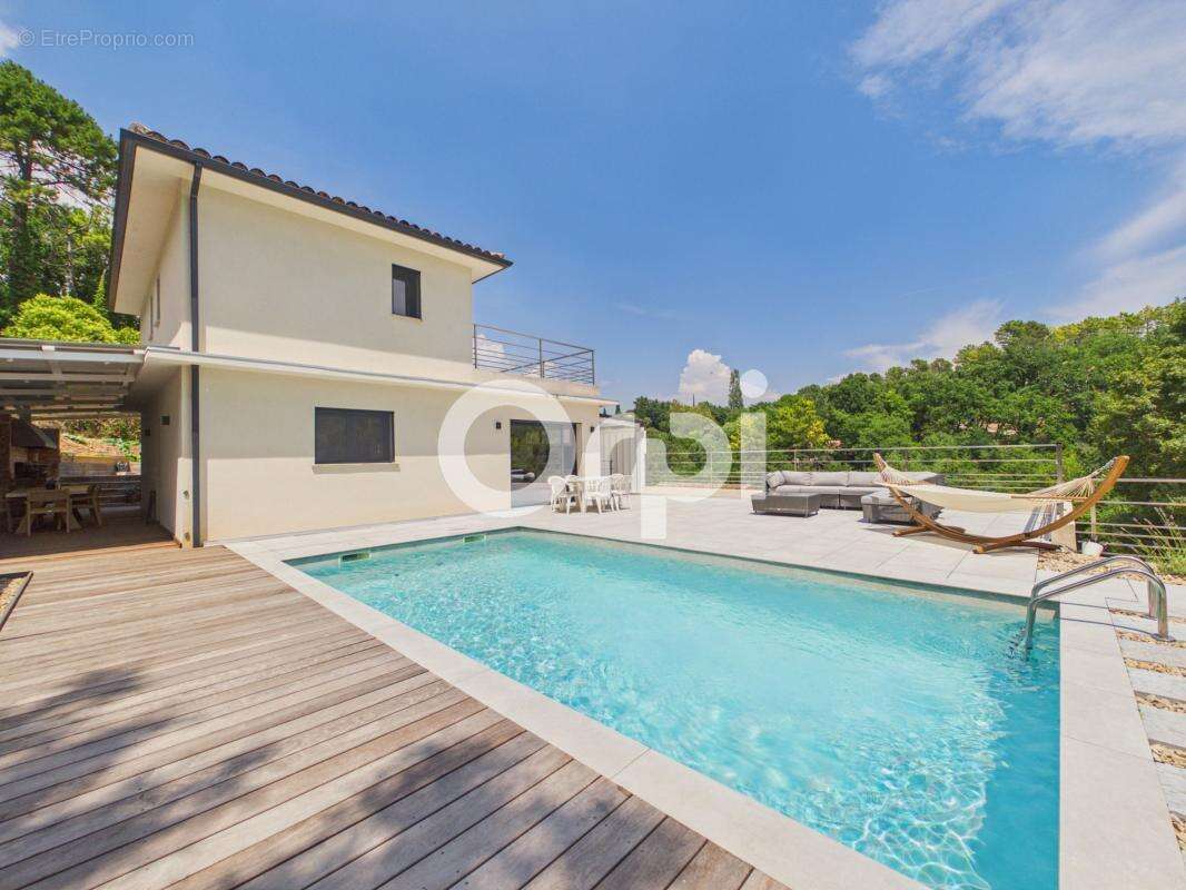 Maison moderne -piscine -vue dégagée - double garage - proche commodités - photo 3