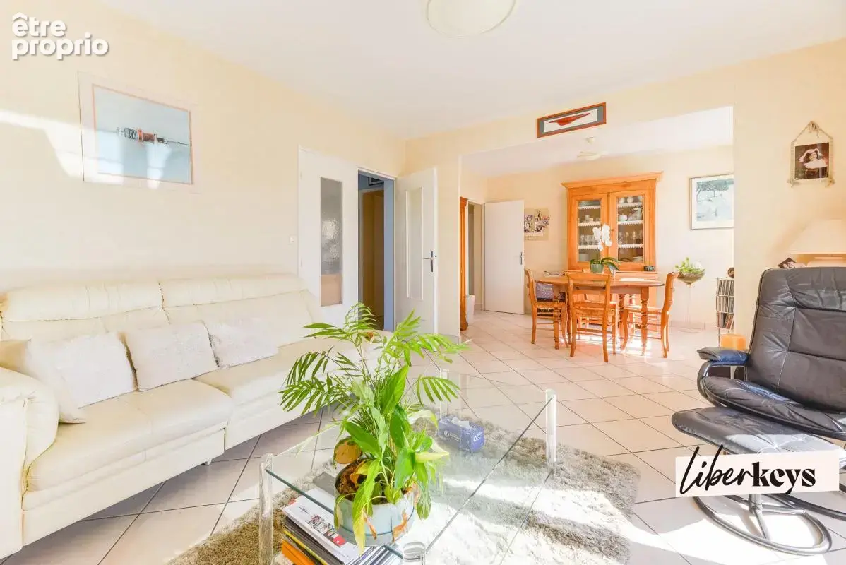 Appartement T4 de 77 m² avec balcon, cave et parking équipé - photo 2