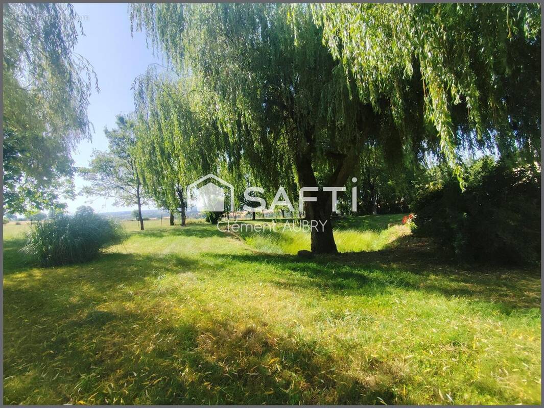 Photo 1 - Maison à SAINT-SATURNIN-DU-LIMET