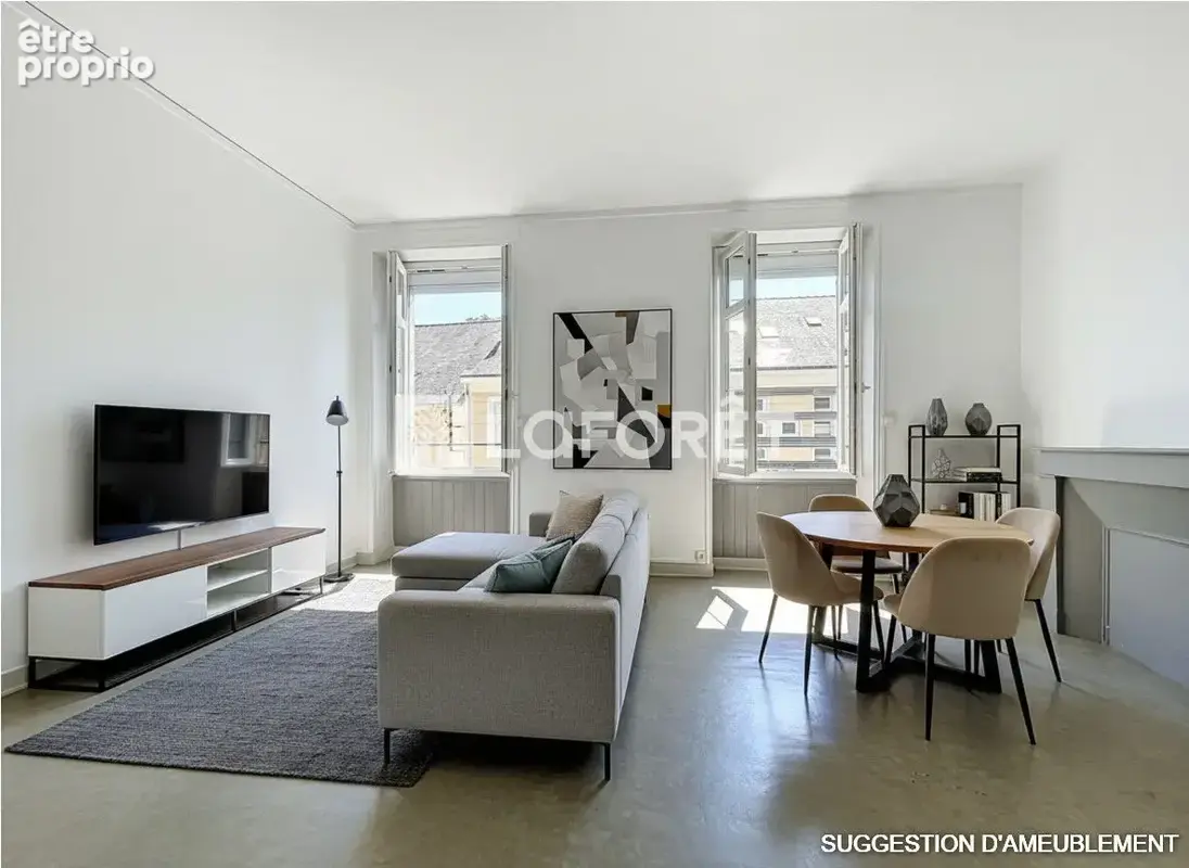 A deux pas de la gare et de la Place de la Visitation T3 de 65m² - photo 4