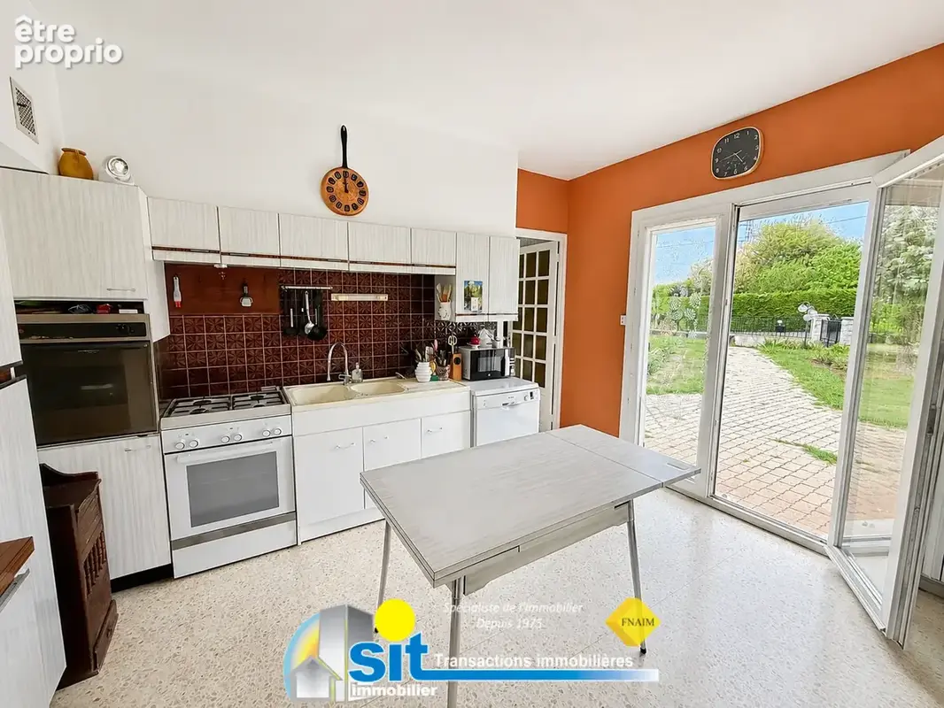 Maison traditionnelle offrant deux logements - photo 10