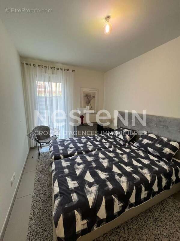 Appartement 3 pièces de 74 m2 situé en bordure de mer au centre du village, à l'entrée du port. - photo 12