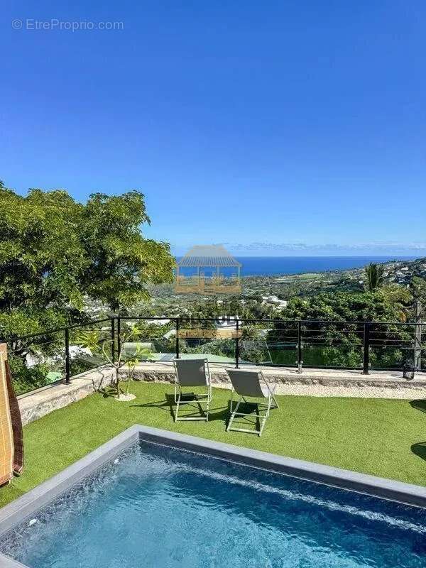 Villa T4 neuve avec piscine chauffée et vue mer imprenable à vendre à L’Étang-Salé - photo 14