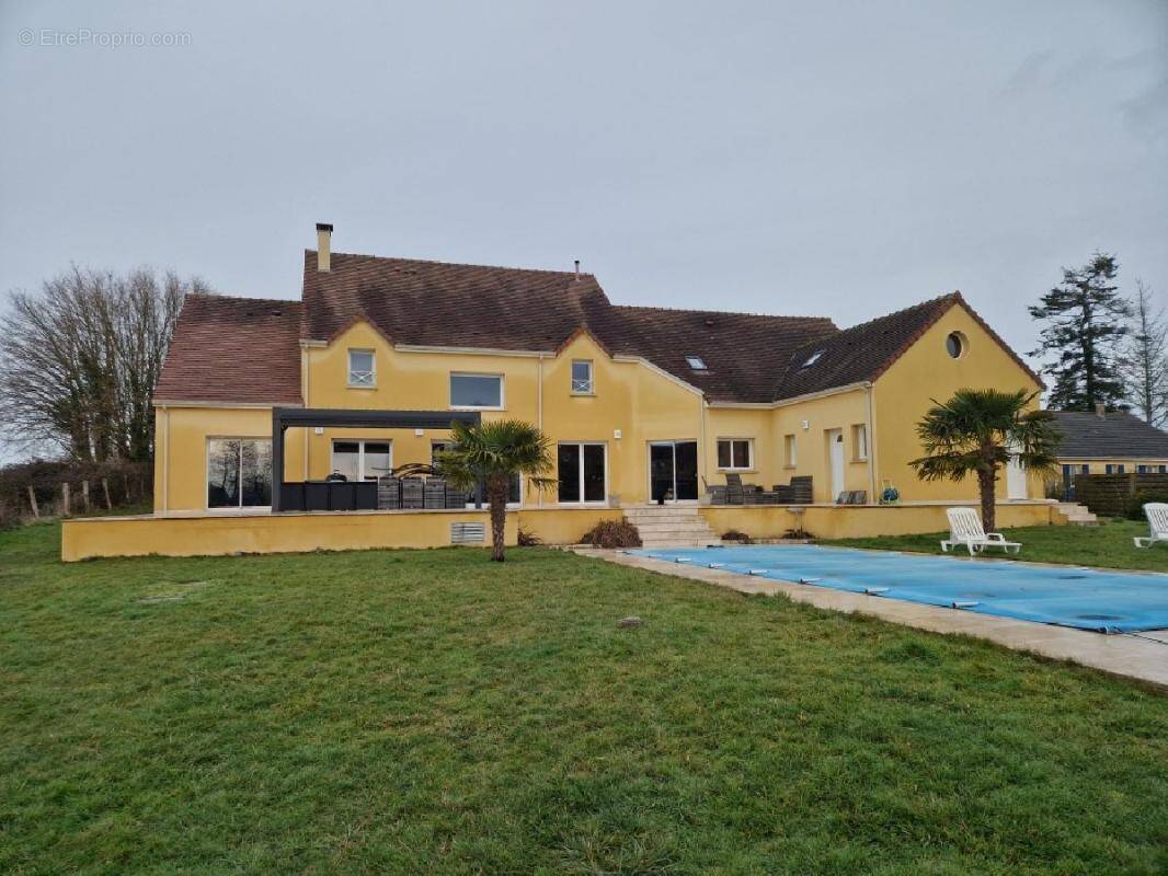 Maison à MANOU