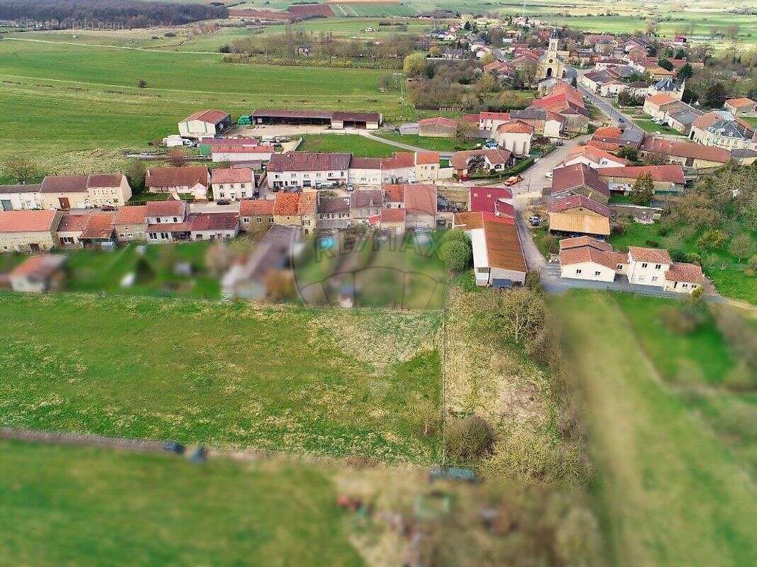 Maison à MANGIENNES
