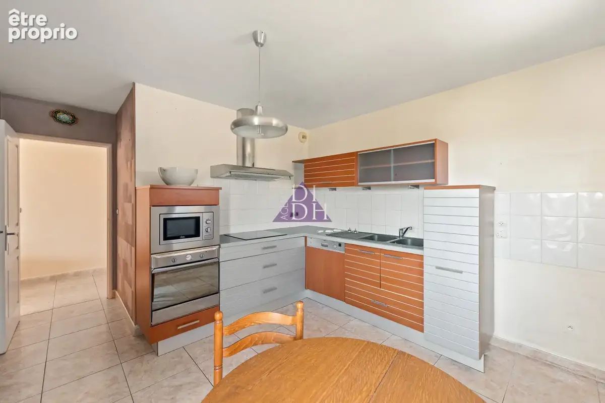Appartement T4 de standing en dernier étage  de 134m2 avec terrasses et garages proche centre ville - photo 6