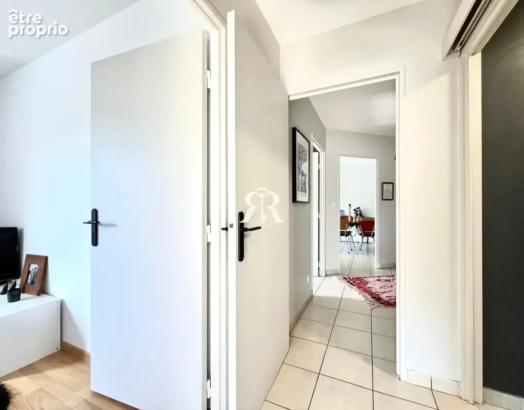Appartement 2 chambres avec balcon, garage et cave - photo 11
