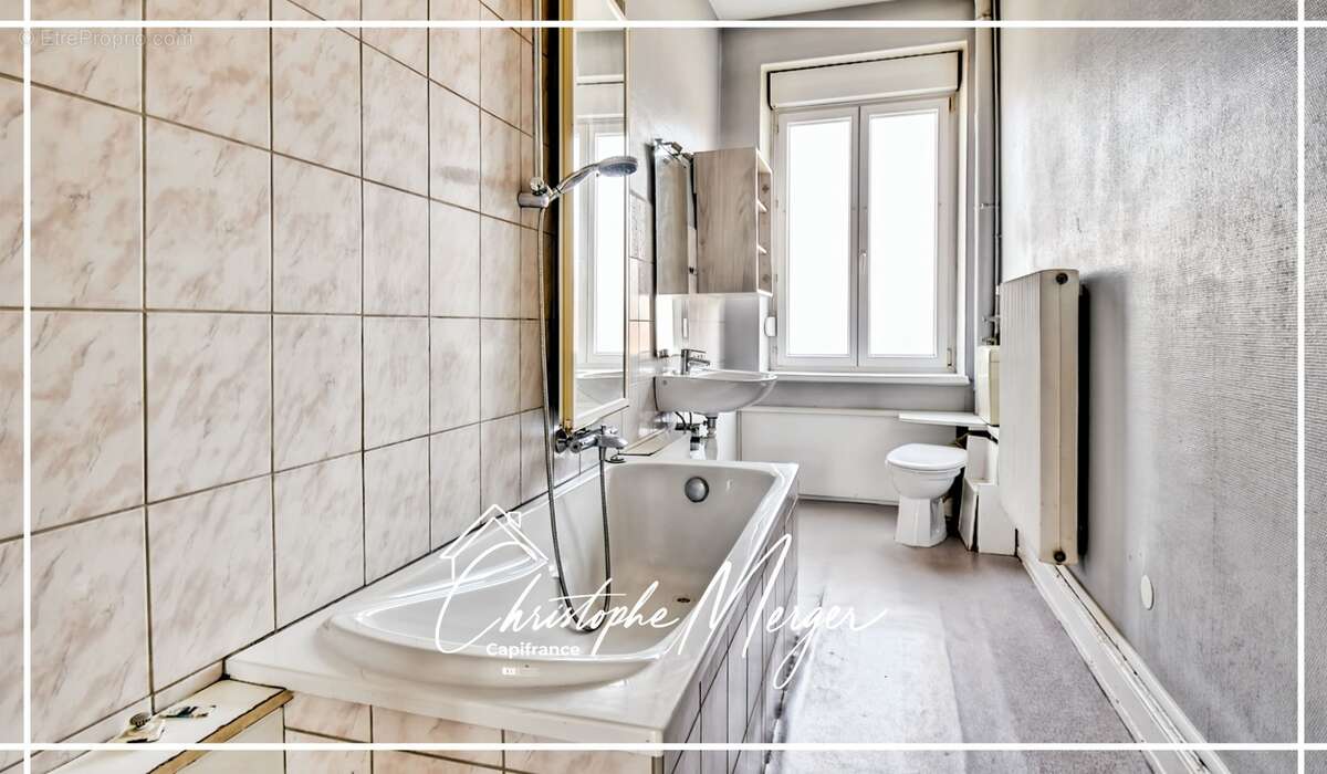 Appartement à vendre 3 chambres 104m² à Sarrebourg (57) en plein centre ville, spacieux et lumineux - photo 7