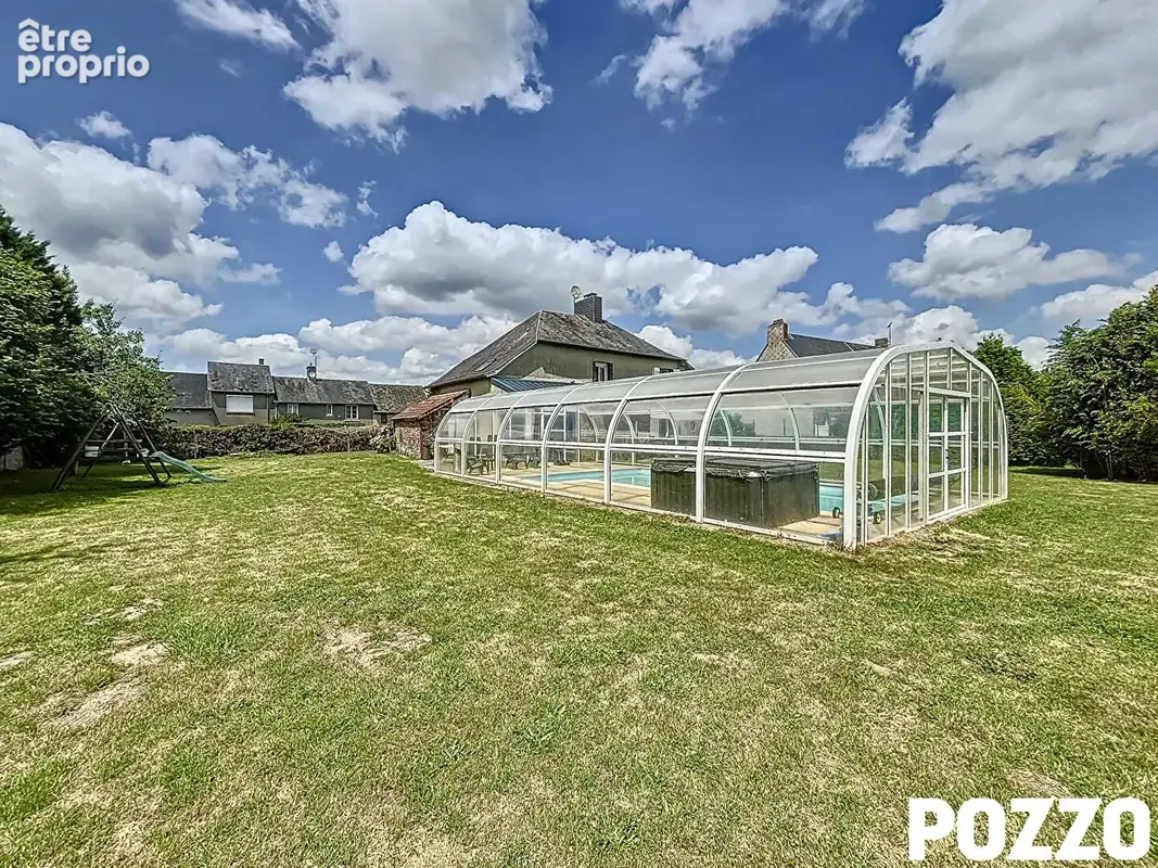 Maison Lengronne (50450) 7 pièce(s) 150 m2 terrain 900 m² piscine - photo 12