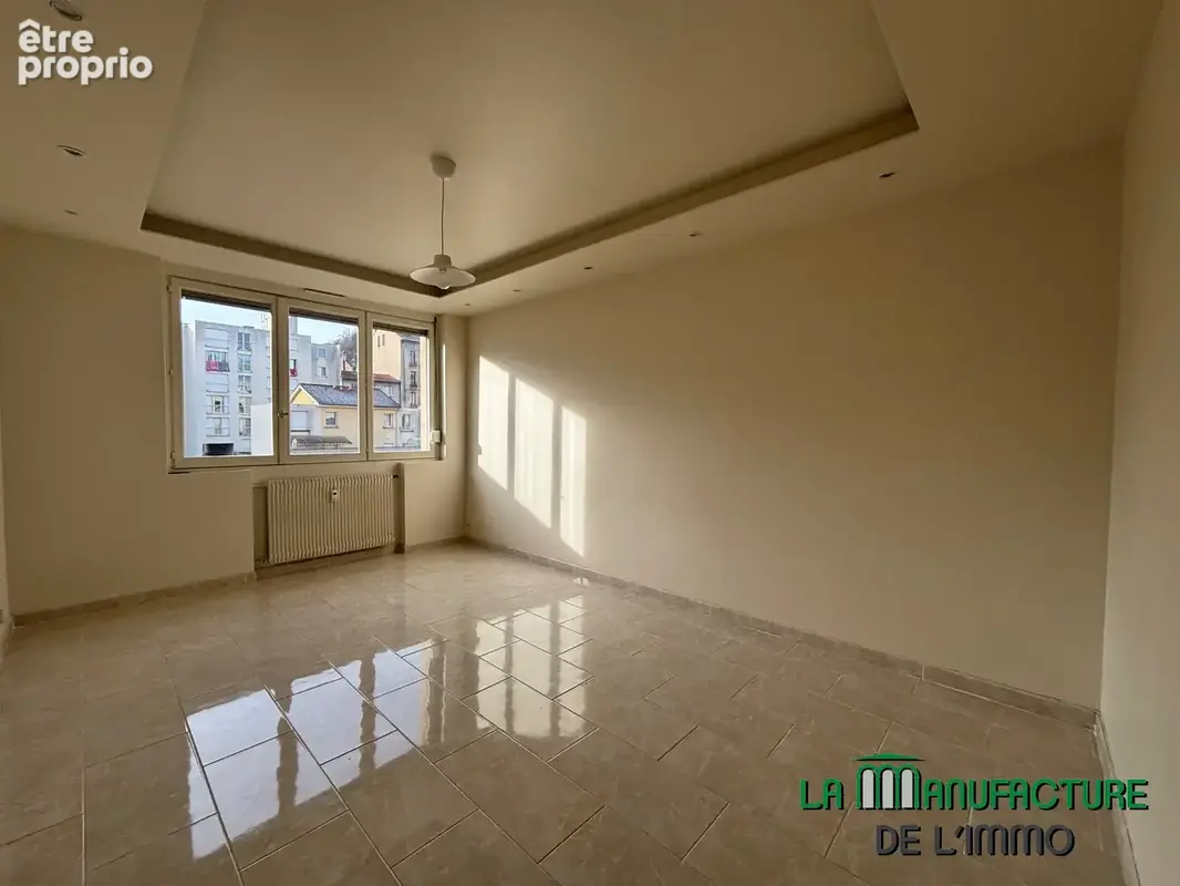Saint etienne rue palluat de besset - appartement t4 renové avec 3 chambres cave et garage - photo 5