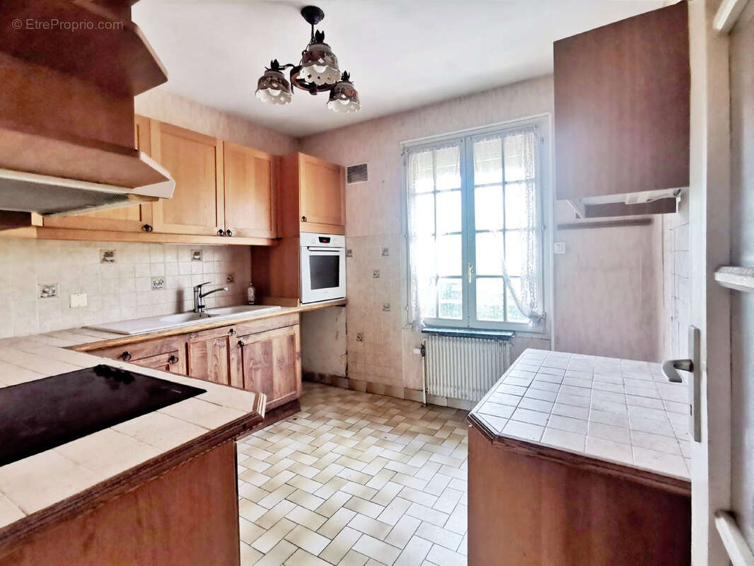 MAISON INDIVIDUELLE DE PLAIN-PIED avec sous-sol total sur 1000m2 de terrain arboré - photo 6