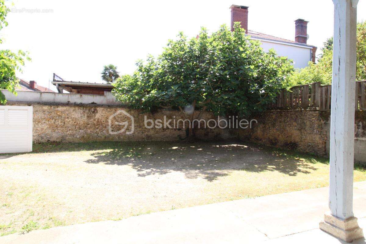 T3 cœur de ville avec jardin - photo 6