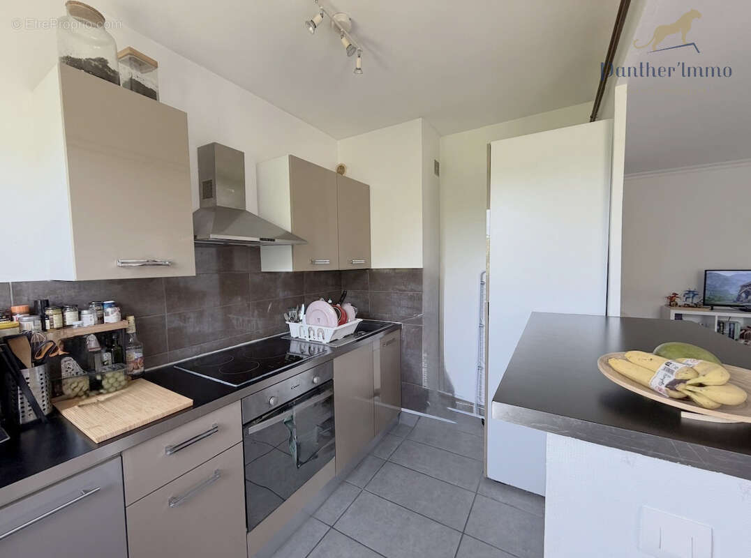 Appartement T2 vue sur Tours, 44m2, cave, parking, très calme. - photo 4