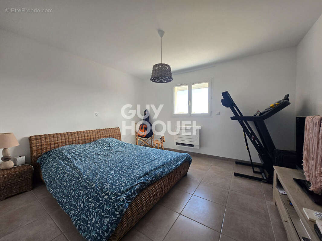 Maison à LAUDUN-L'ARDOISE