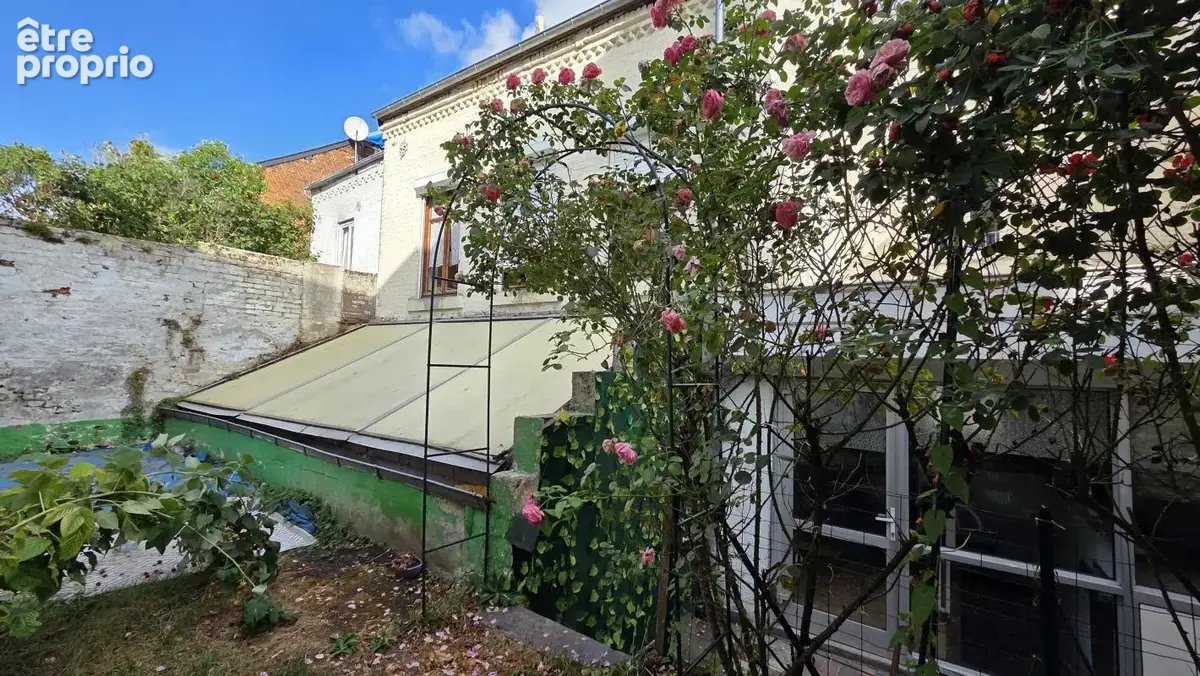 Immeuble comprenant une surface commerciale, une maison et un garage, situé en centre ville de Fourmies - photo 14
