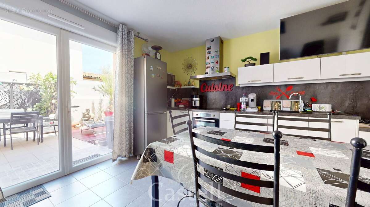 *** appartement t3 en rez-de-jardin avec terrasses, jardin privatif et parkings *** - photo 3