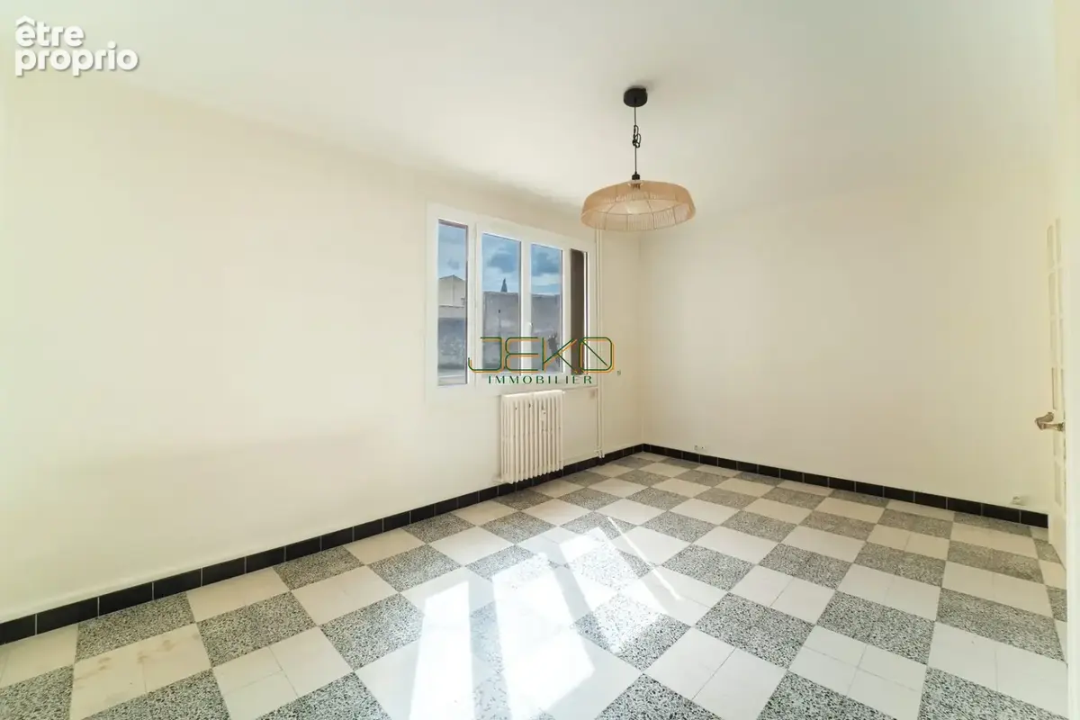 Appartement 3 pièces 66 m² à vendre à Nimes (30900) - photo 2