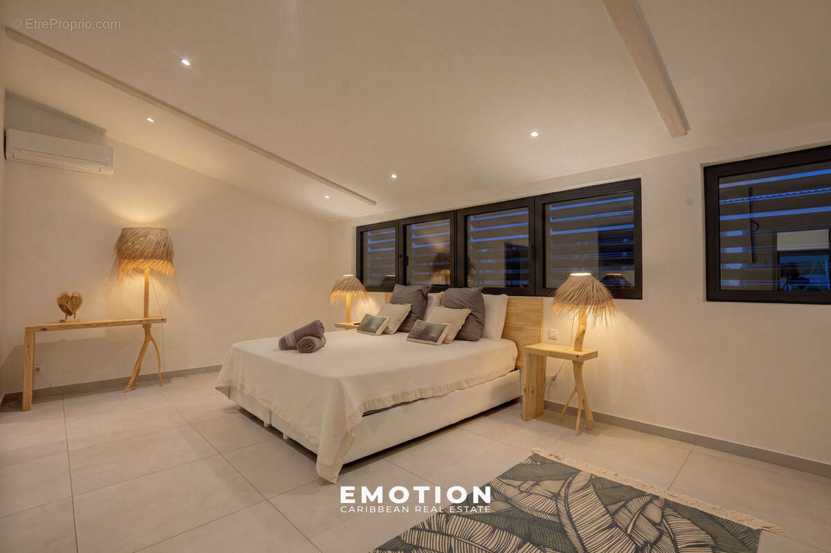 Duplex 140m2 - T3 - Vue marina Anse Marcel - photo 11