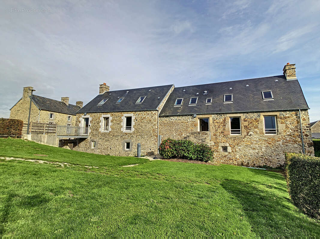 Maison à AGON-COUTAINVILLE