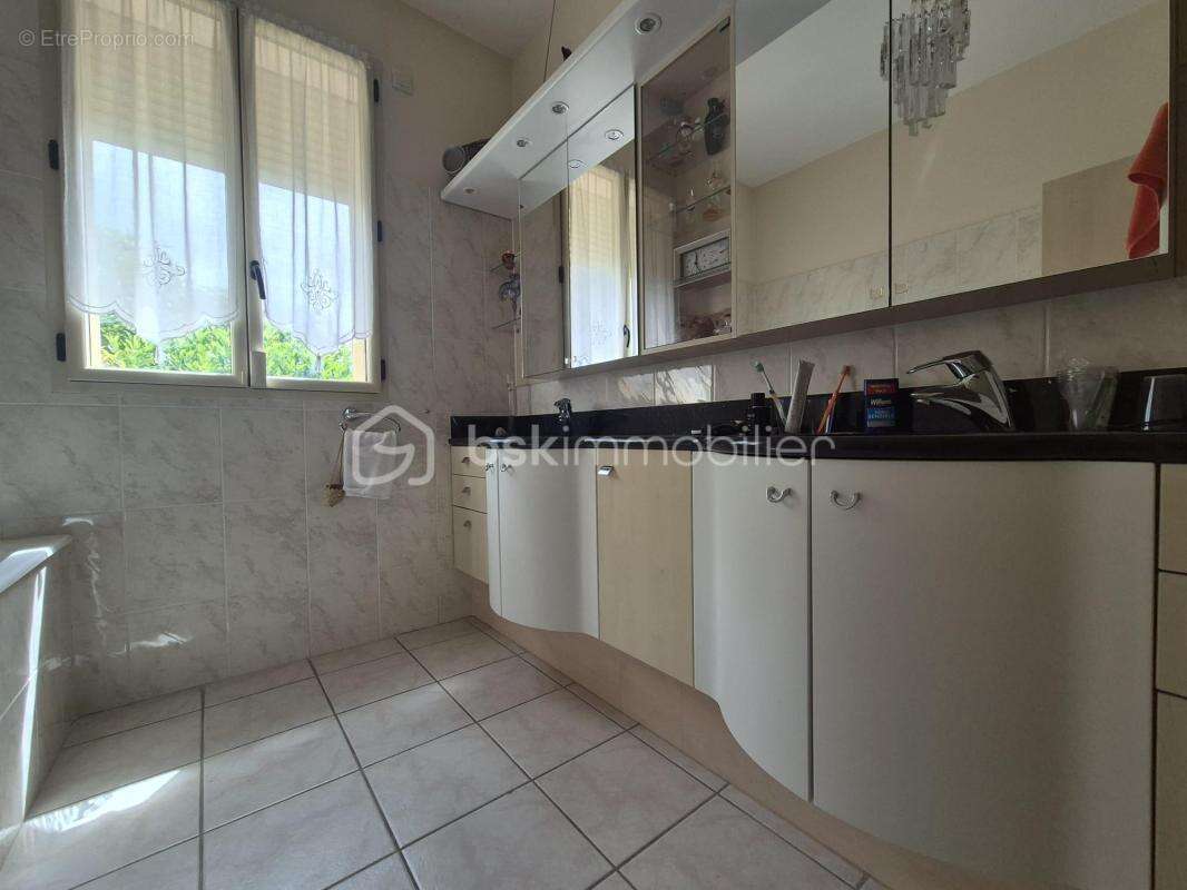 Maison de plain-pied de 124 m² - photo 10