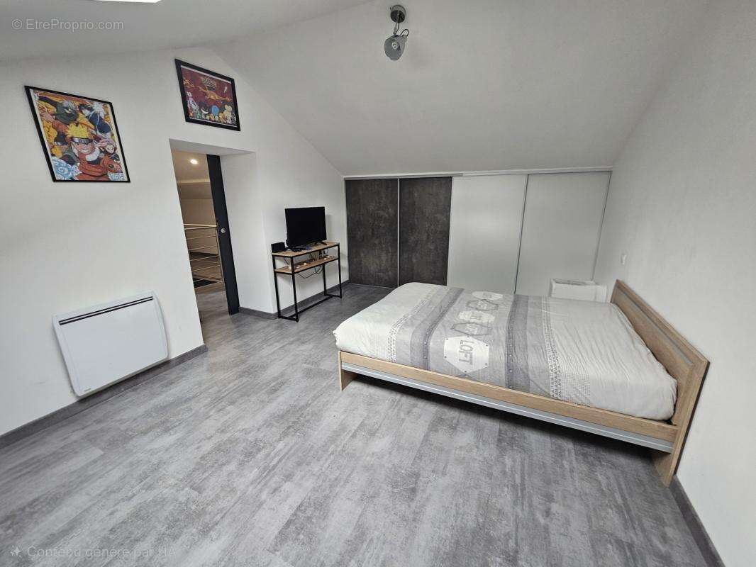 LE CENDRE – Maison familiale rénovée avec 5 chambres, garage de 98 m² et jardin intime - photo 9