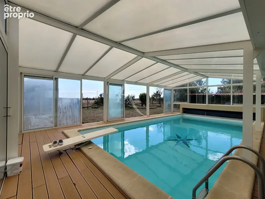 Maison de plain-pied avec piscine à La Jarrie - photo 10