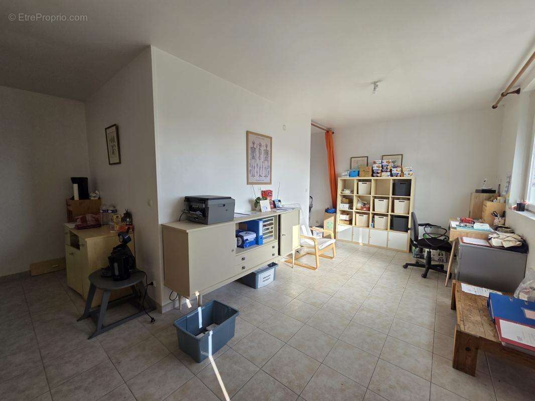 Ensemble immobilier 3 logements-parking- centre bourg neulli - photo 13