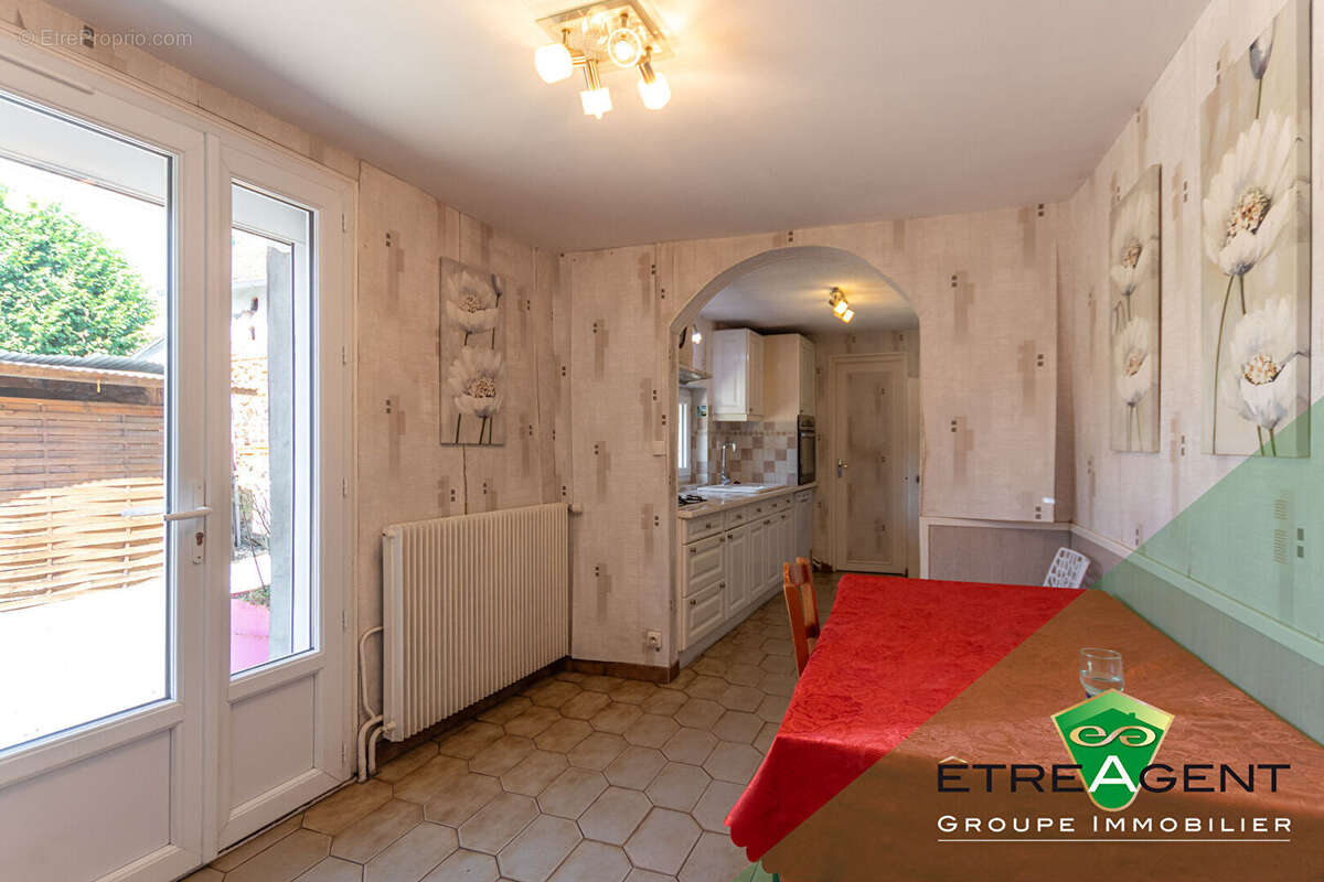 Maison DAMVILLE CENTRE-VILLE - 142 m² - 3 chambres - photo 8