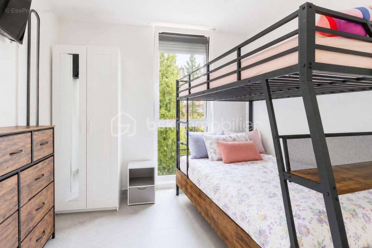 Appartement T3 en rez-de jardin avec loggia - photo 11