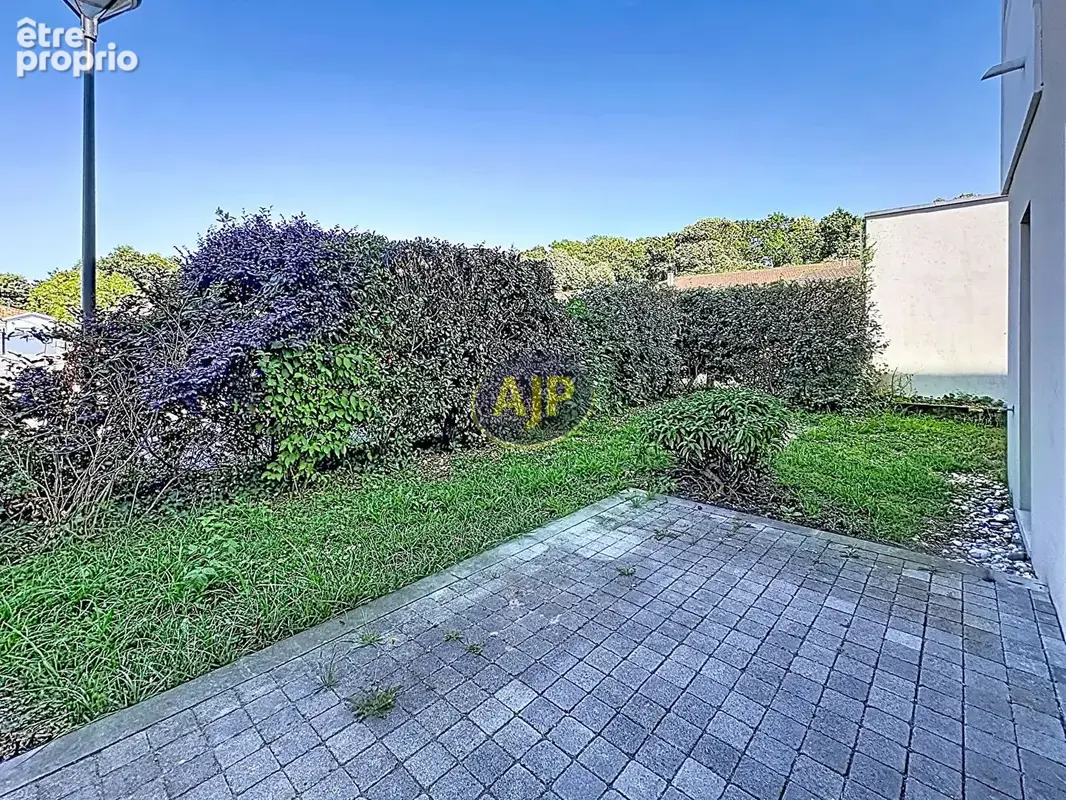 Appartement T4 avec terrasse et jardin - photo 4