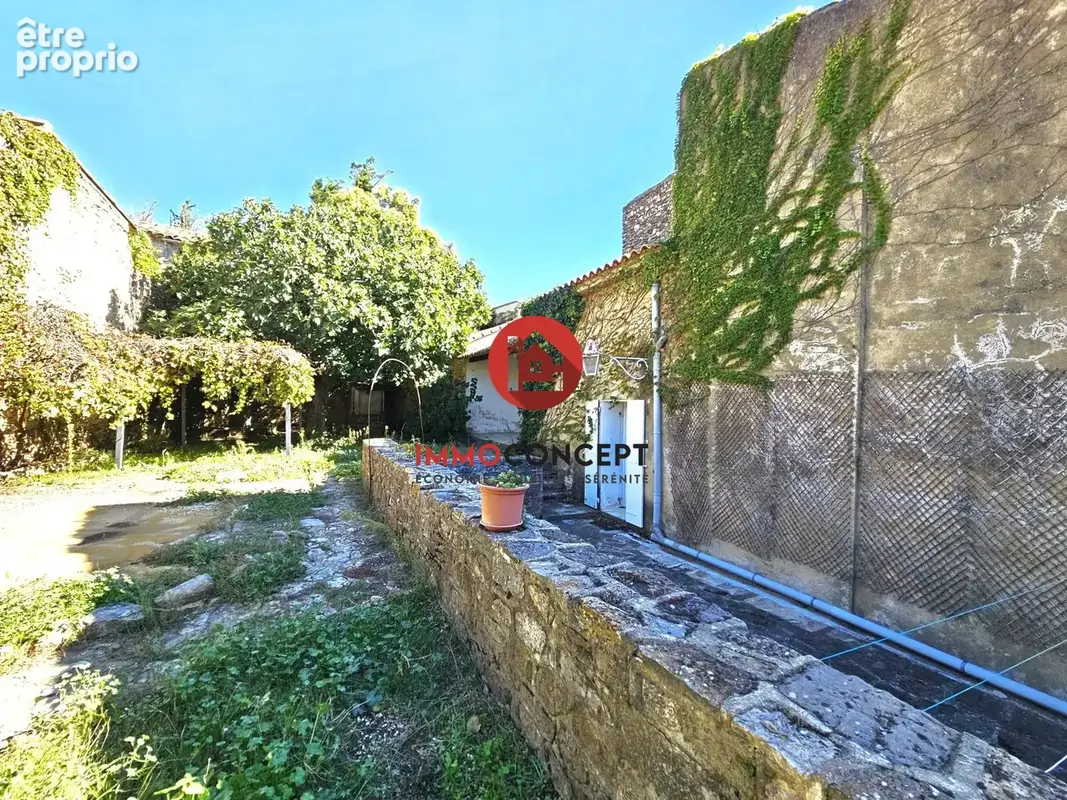 Maison à LAUDUN-L'ARDOISE