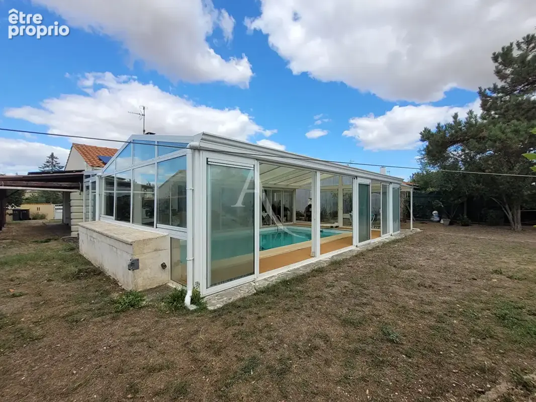 Maison de plain-pied avec piscine à La Jarrie - photo 12