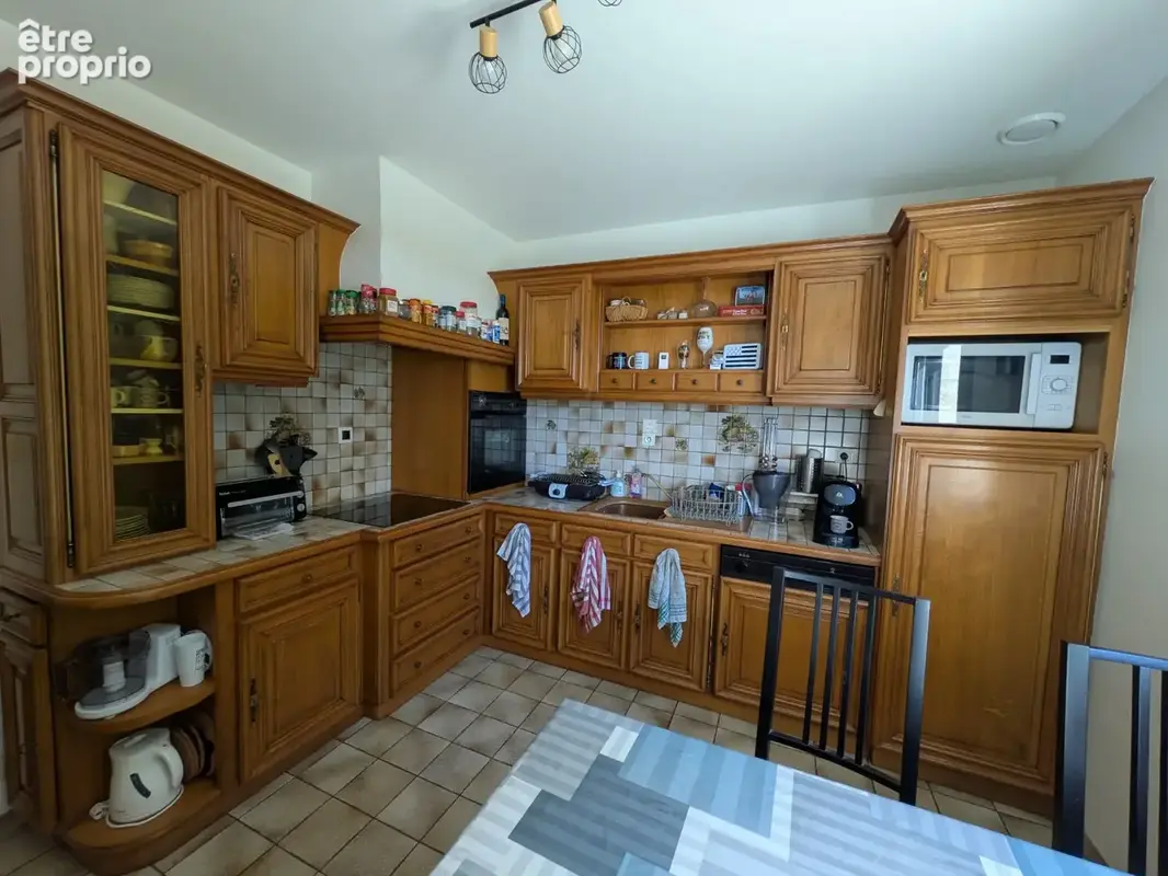 Guern jolie maison néo bretonne avec une vie de plain pied de 4 pieces de 100m² environ sur parcelle de 911m² - photo 9