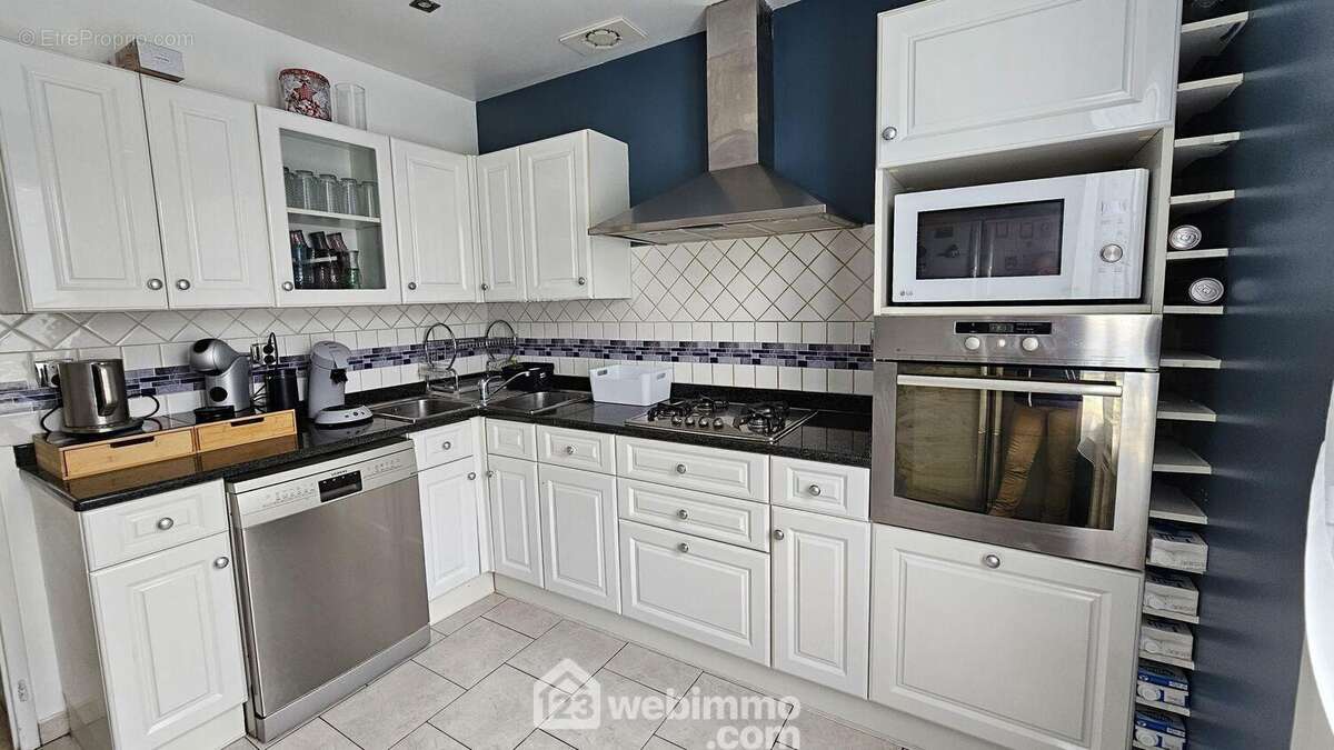 Une cuisine fonctionnelle. - Maison à MILLY-LA-FORET