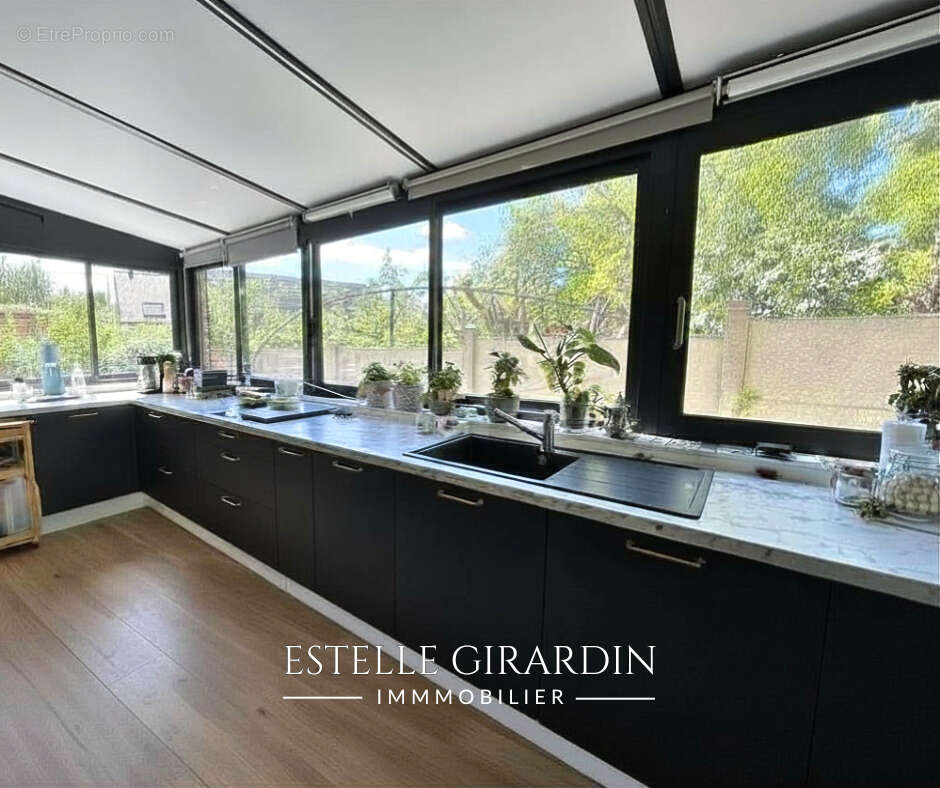 Plain-pied 125 m²  dans le bourg de Carquefou - 3 chambres + bureau - Jardin - photo 4