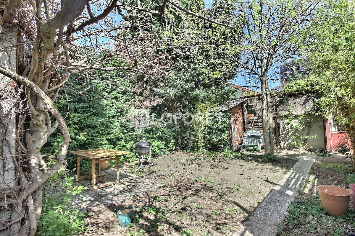 Maison à COURBEVOIE