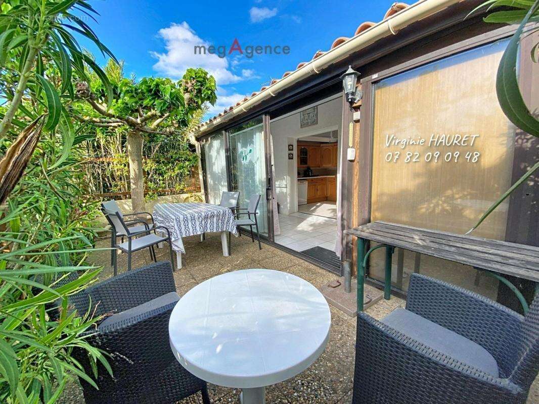 Pavillon 50m² - 3 chambres - 1 terrasse 21m² -  1 cellier - 1 place de parking - photo 2