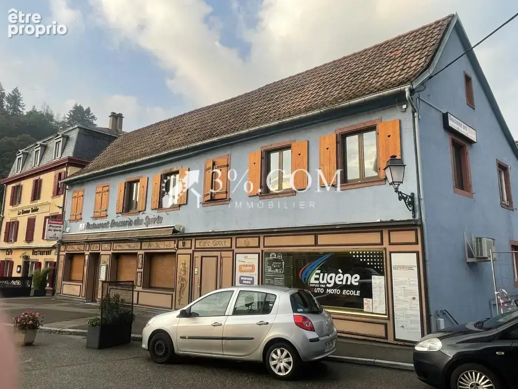 IMMEUBLE DE RAPPORT  Commerces et 3 appartements - photo 5