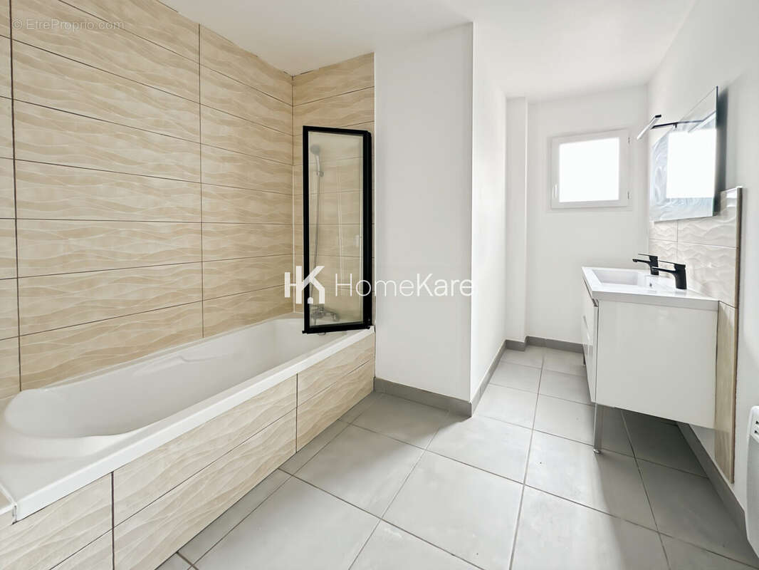 Maison 100 m² à Carbonne  - photo 7