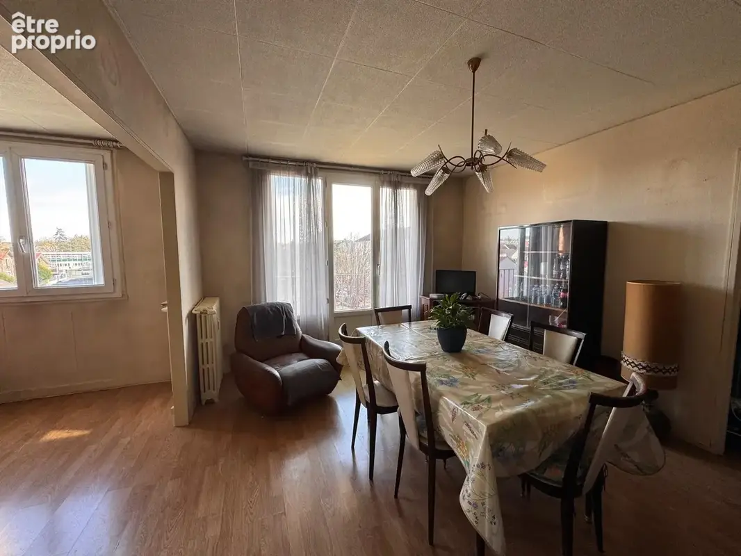Appartement 4 pièces à Brétigny-sur-Orge   Résidence arborée, balcons et fort potentiel - photo 3